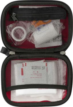 A black first aid kit with red interior, featuring bandages, gauze, adhesive tape, and various medical supplies.
