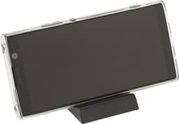 A plastic wireless charger in black, featuring a simple design with a stand for a phone.