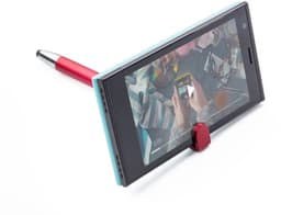 A red ABS 3-in-1 ballpen positioned beside a smartphone, featuring a blue casing and a stand function.