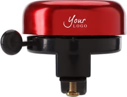 A red aluminium bicycle bell with a black base and a simple lever mechanism. Features a visible logo.