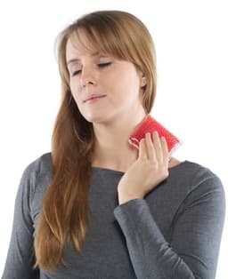 A PVC hot/cold pack in a clear casing, being held by a woman against her neck. The pack is filled with red gel.