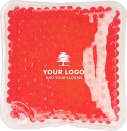 A red PVC hot/cold pack with a textured surface and an embedded logo.