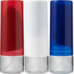 Three spray bottles in red, white, and blue, each with a clear base and a capped top. One bottle is transparent.