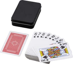 A black metal tin containing a deck of playing cards displayed in a fan, with a single card shown face up.