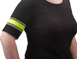 An Elastane arm band in black with bright yellow reflective stripes, worn on a person's upper arm.
