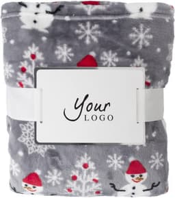 A grey blanket featuring snowman and snowflake patterns, neatly folded with a branded label.