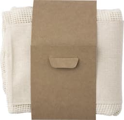 A set of three reusable cotton mesh produce bags, secured with a brown paper band, in a cream colour.