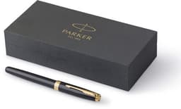 A Parker Sonnet rollerball pen in black with gold accents, displayed beside its elegant black box featuring a logo.