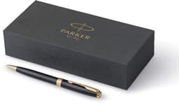 A black Parker Sonnet ballpen with gold accents, placed next to a black box featuring a brand logo.