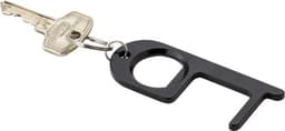 A black aluminium door opener attached to a keyring with a key.