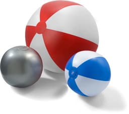 Three PVC beach balls in red and white, blue and white, and a metallic grey. Each ball has a valve and varying sizes.