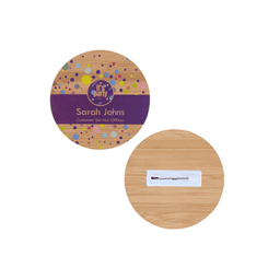 A round, 75mm bamboo magnet featuring a colourful pattern and a white backing. It includes a brand logo.