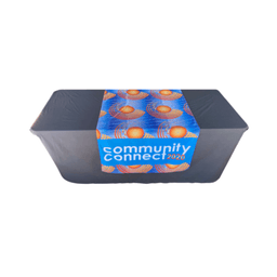A table with a vibrant blue sublimated table runner featuring a sun design and a logo.