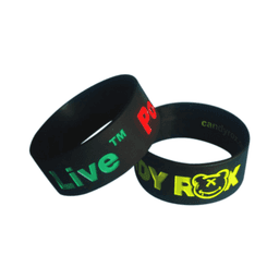 Two silicone wristbands in black with debossed, ink-filled lettering in green, red, and yellow, featuring logos.