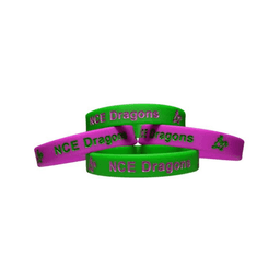 A set of silicone wristbands in green and pink, featuring debossed and ink-filled designs with a logo.