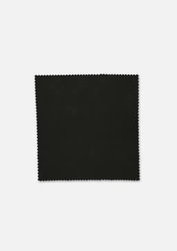 A square piece of black fabric with a fine, textured edge, showcasing a plain design.