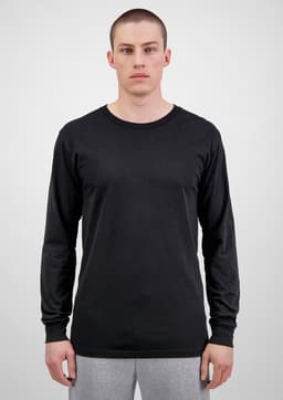 A black long sleeve t-shirt displayed on a model with grey sweatpants. The shirt features a logo.