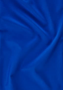 A smooth, vibrant blue fabric, showcasing a rich texture and colour, suitable for tunic designs.