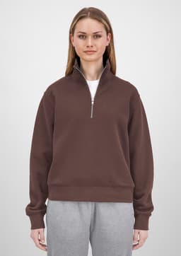 A brown zip-up women's jumper with a high collar and long sleeves, featuring a relaxed fit.