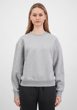 A grey women's crew sweatshirt is displayed, featuring long sleeves and a relaxed fit, with a logo on the front.