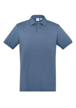 A short sleeve polo shirt in a soft blue colour, featuring a collar and three buttons, with a brand logo present.