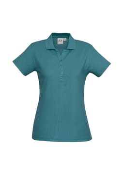 A teal polo shirt for ladies with a collar and button placket, featuring a logo on the label.
