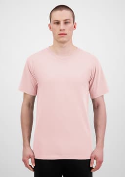 A plain pink short sleeve tee is displayed on a model against a neutral background. The shirt features a logo.