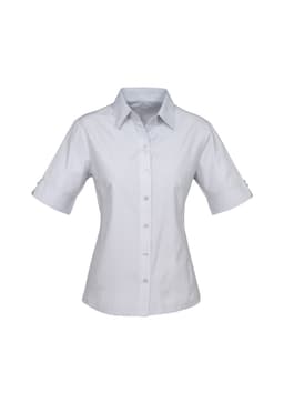 A button-up shirt in light grey with short sleeves and a fitted design, featuring a subtle branding logo.