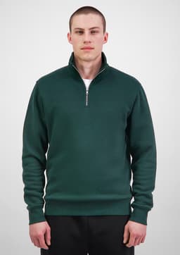 A green men's 1/4 zip sweatshirt displayed on a model, featuring a collar and long sleeves.