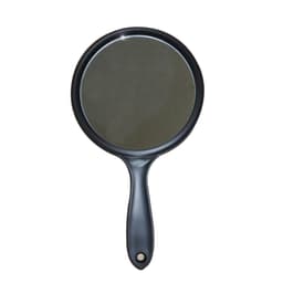 A double-sided mirror with a black handle and a circular reflective surface.