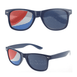 Novelty pinhole eyeglasses featuring a blue frame with red and white patterned lenses. Logo present on the design.