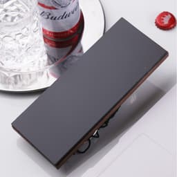 A black and brown drink bottle opener with a sleek design, featuring a logo.