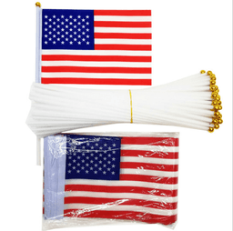 A set of small American flags with red and white stripes and blue stars on a white stick, bundled together.
