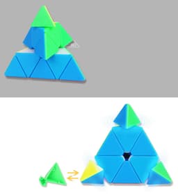 A triangular cube made of blue and green pieces, stacked in a pyramid shape. It features a playful, modular design.