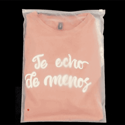 A pink t-shirt with white text is packaged in a clear, waterproof zip-lock storage bag.