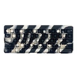 A fidget keyboard featuring a black and white zebra-striped design with poppable keys.