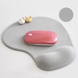 A grey office mousepad with a pink mouse and two small decorative figures. Features a wrist rest section.