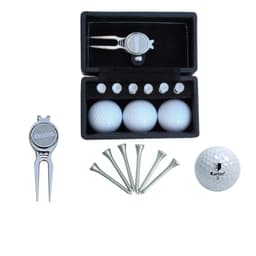 A golf set featuring three white golf balls, tees, a pitch fork, and a black case with a logo.