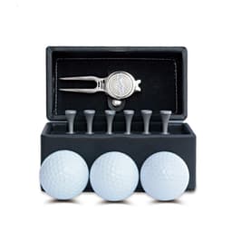 A black box containing three white golf balls, a silver pitchfork tool, and wooden tees. The box has a logo.