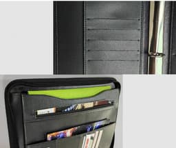 A black ring binder featuring multiple card slots, a flat pocket, and a metallic ring mechanism.
