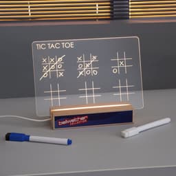 A light-up tic-tac-toe game on a wooden base, featuring white graphics and two markers. It has a logo on the base.