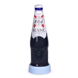 A drink bottle with a blue base, showcasing a frosty beverage inside, resting on a light blue coaster.
