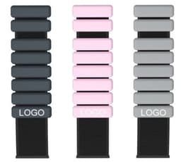 A collection of silicone weighted bracelets in black, pink, and grey, each displaying a logo.