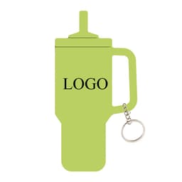 A green tumbler-shaped silicone key ring with a handle and attached keychain. It features a logo.