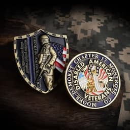 A custom-shaped soft enamel coin featuring a soldier with an American flag and a round coin with a veterans' emblem.