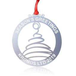 A silver etched ornament featuring a decorative design and a red hanging ribbon. It includes a logo.