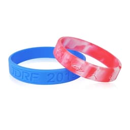 Two silicone wristbands; one is solid blue with debossed text, and the other is marbled red and white.
