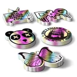 Five custom holographic stickers in various shapes featuring vibrant colours, including a panda, butterfly, and text designs.