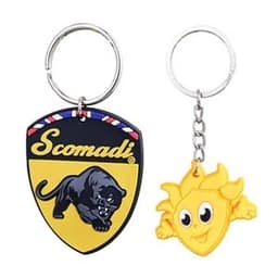 Two custom 3D PVC keychains featuring a black panther design and a cheerful yellow character, both attached to metal key rings.