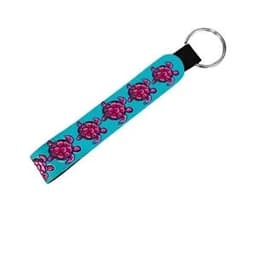 A turquoise neoprene wristlet keychain lanyard featuring pink turtle designs and a metal keyring.